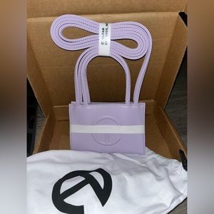 Small lavender Telfar shopping bag